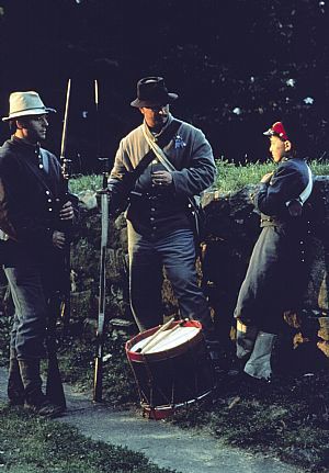 civil war soldiers by stone wall